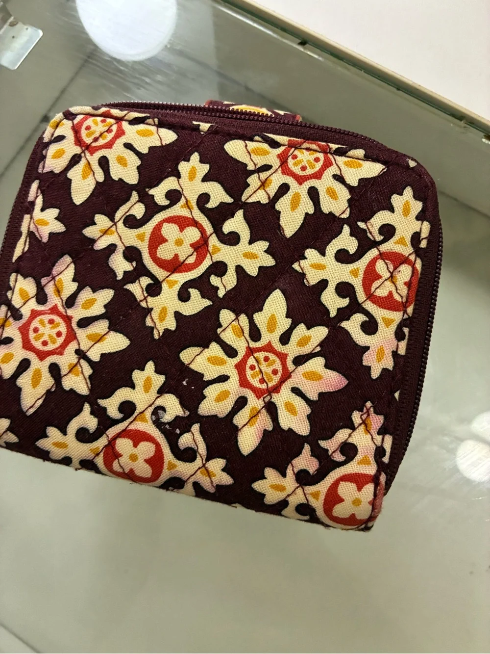 Vera Bradley Bifold Square Zip Wallet Has pink staining on back of wallet shown